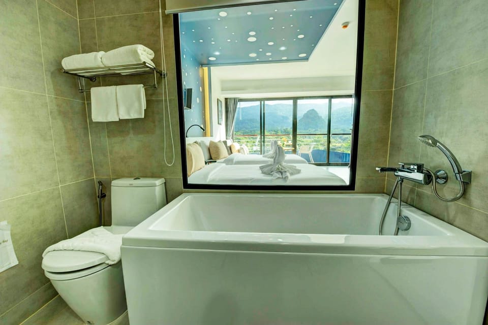 Separate tub and shower, free toiletries, hair dryer, bathrobes