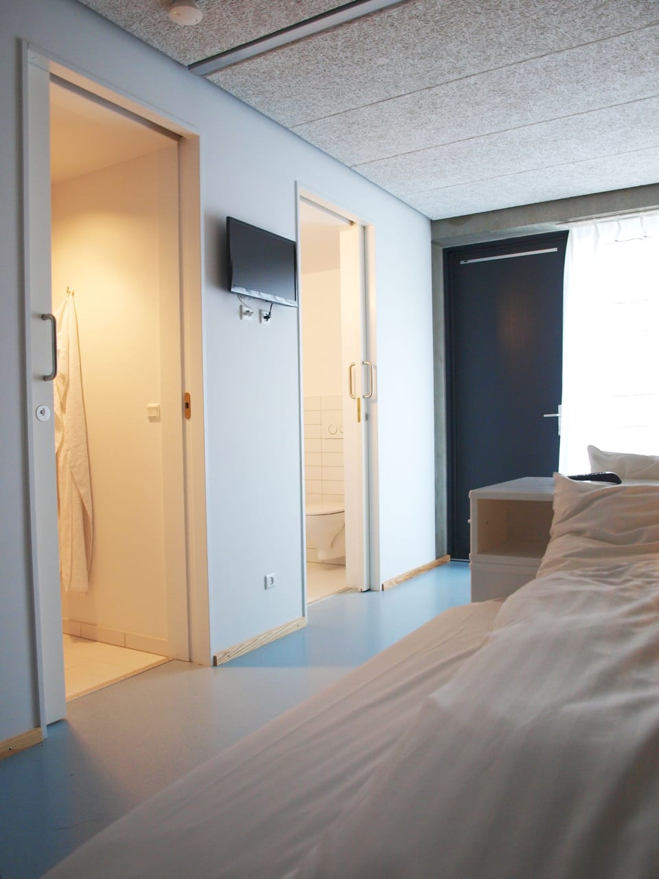 Desk, blackout drapes, soundproofing, iron/ironing board