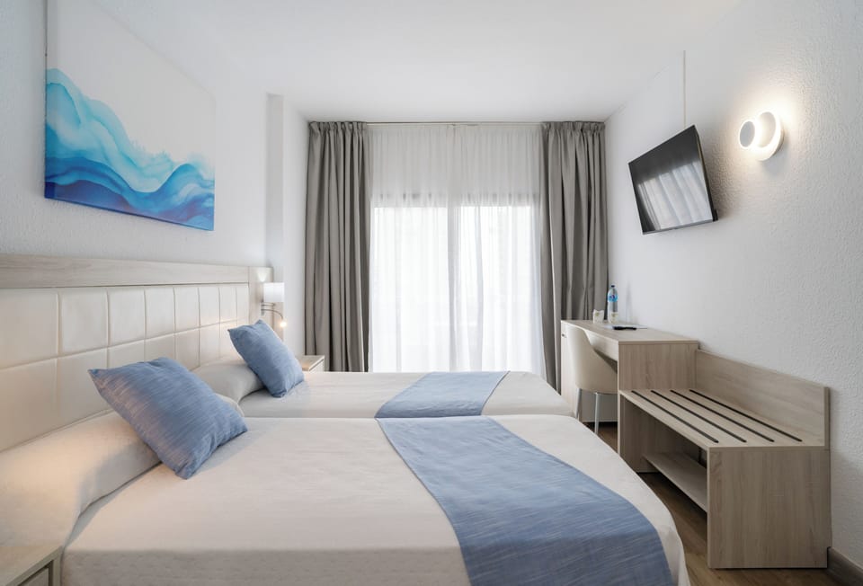 Desk, laptop workspace, blackout drapes, free WiFi