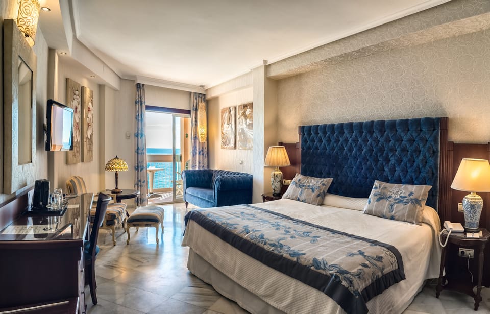Junior Suite, Balcony, Sea View | Minibar, in-room safe, desk, free WiFi