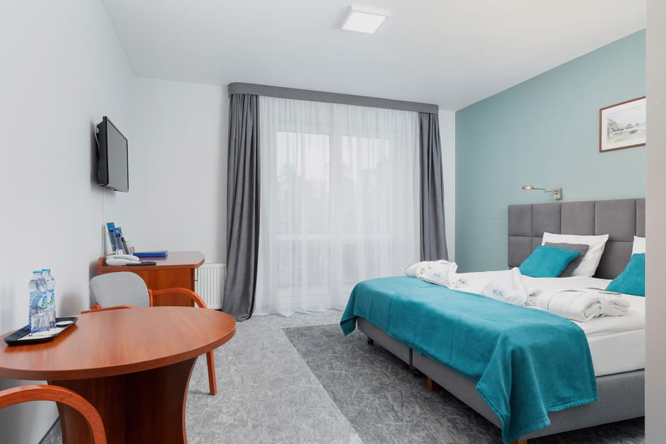 In-room safe, desk, iron/ironing board, free cribs/infant beds