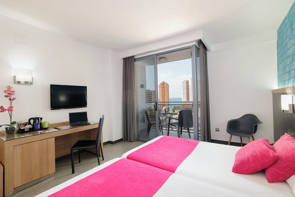 Minibar, desk, laptop workspace, blackout drapes