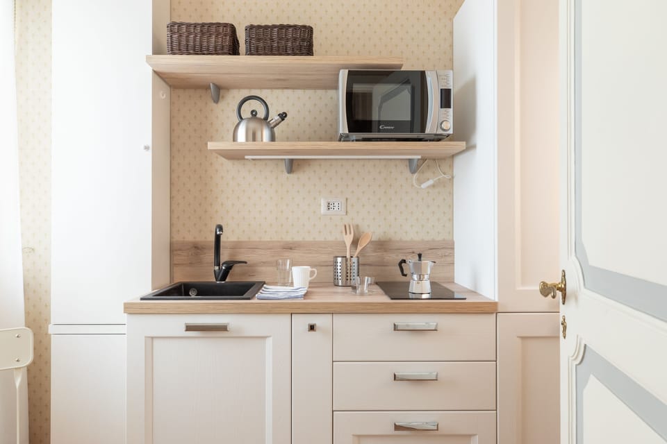 Suite Familiare Deluxe | Private kitchenette | Electric kettle