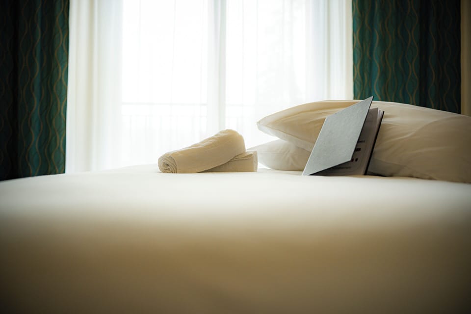 Desk, soundproofing, iron/ironing board, free cribs/infant beds