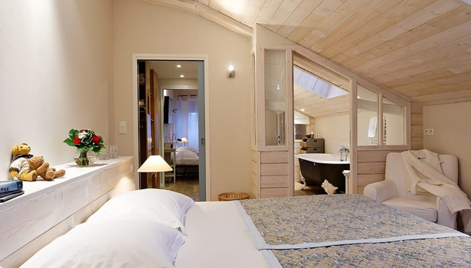 Family Suite, 2 Bedrooms | In-room safe, desk, iron/ironing board, free WiFi