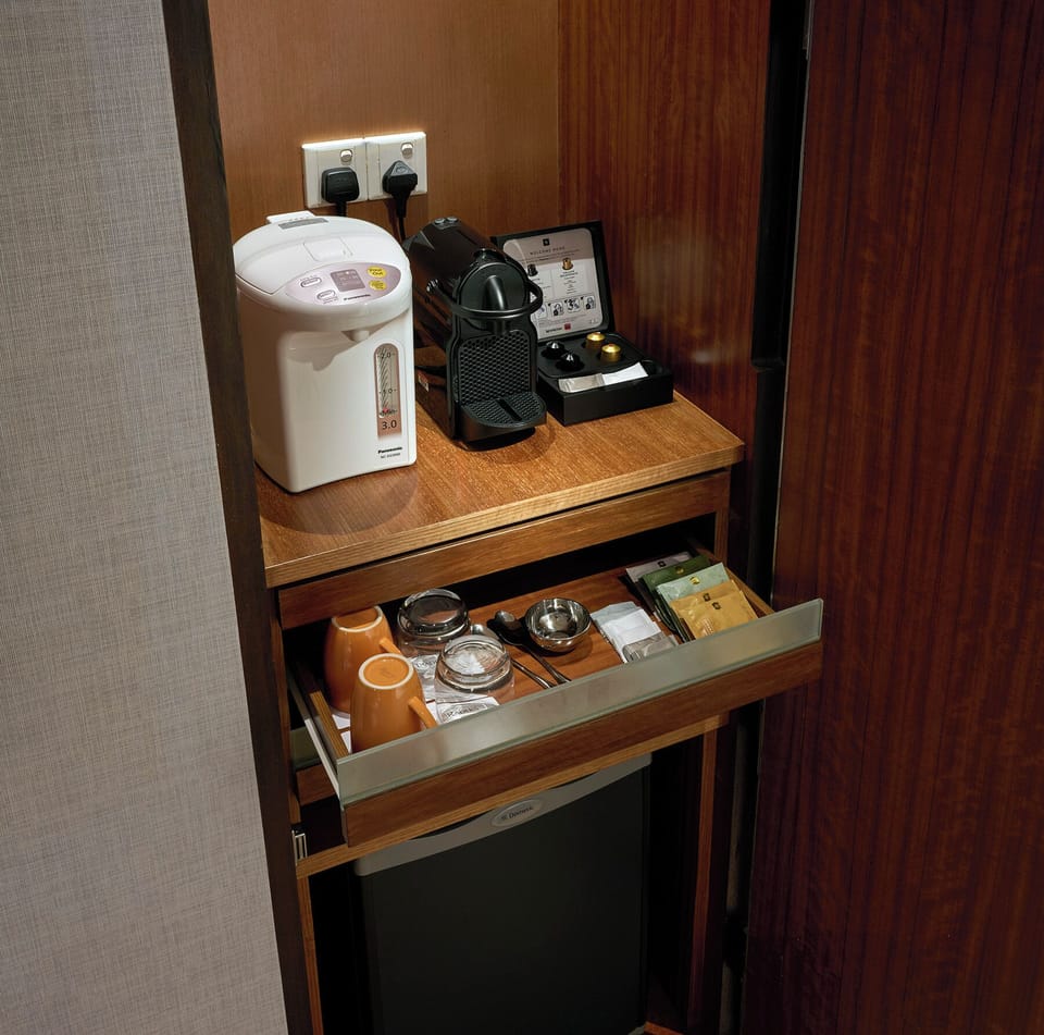 Hypo-allergenic bedding, down comforters, minibar, in-room safe