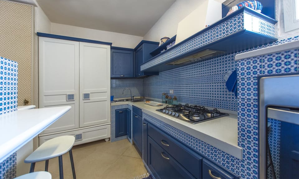 Villa, 4 Bedrooms | Private kitchen | Full-size fridge, microwave, oven, espresso maker