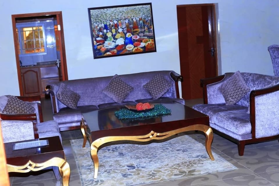 Presidential Suite, River View | Living area | Flat-screen TV