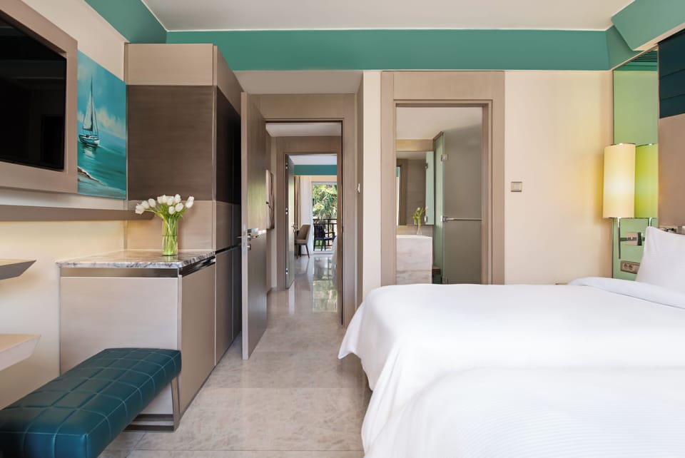 Family Garden Suite | Minibar (free items), in-room safe, laptop workspace, cribs (free)