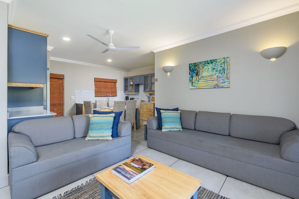 Two Bedroom Chalet with Patio | Living room | 42-inch flat-screen TV with satellite channels, TV