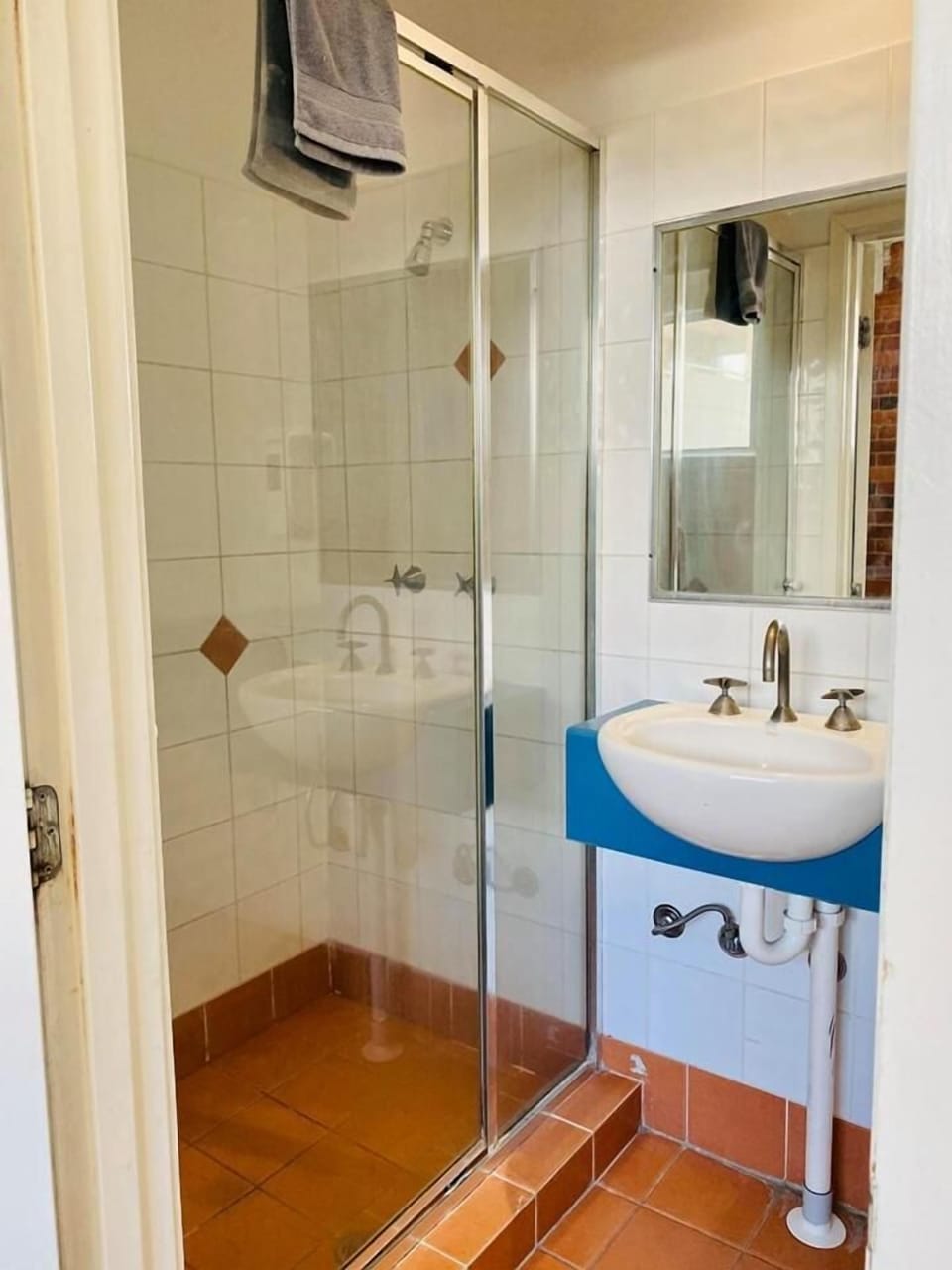 Shower, hair dryer (on request), towels