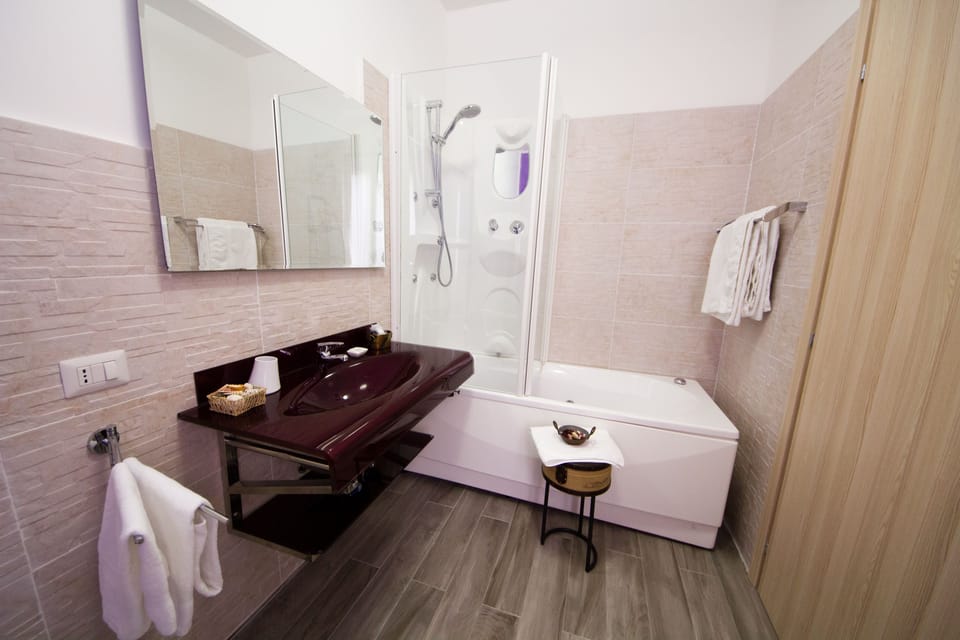 Shower, free toiletries, hair dryer, bathrobes