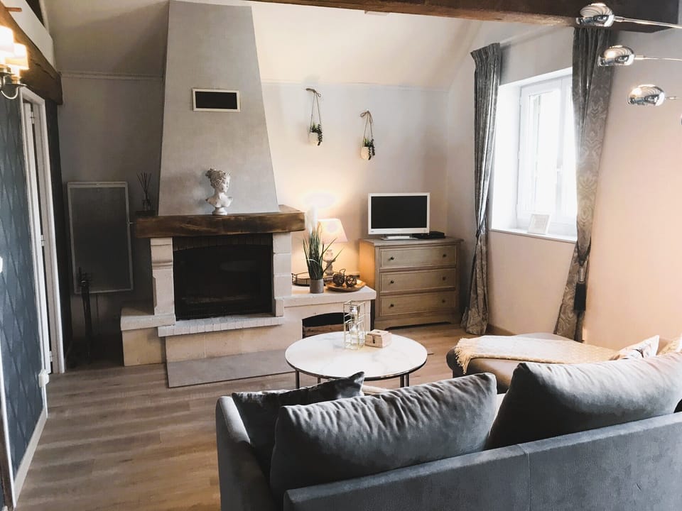 Family Suite, 2 Bedrooms, Refrigerator & Microwave, Park View | Living area | 74-cm flat-screen TV with cable channels, TV