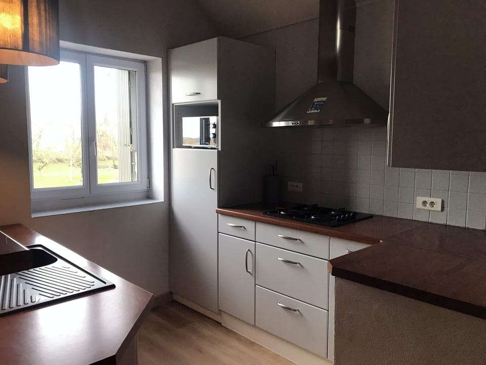 Family Suite, 2 Bedrooms, Refrigerator & Microwave, Park View | Private kitchen | Espresso maker, coffee/tea maker