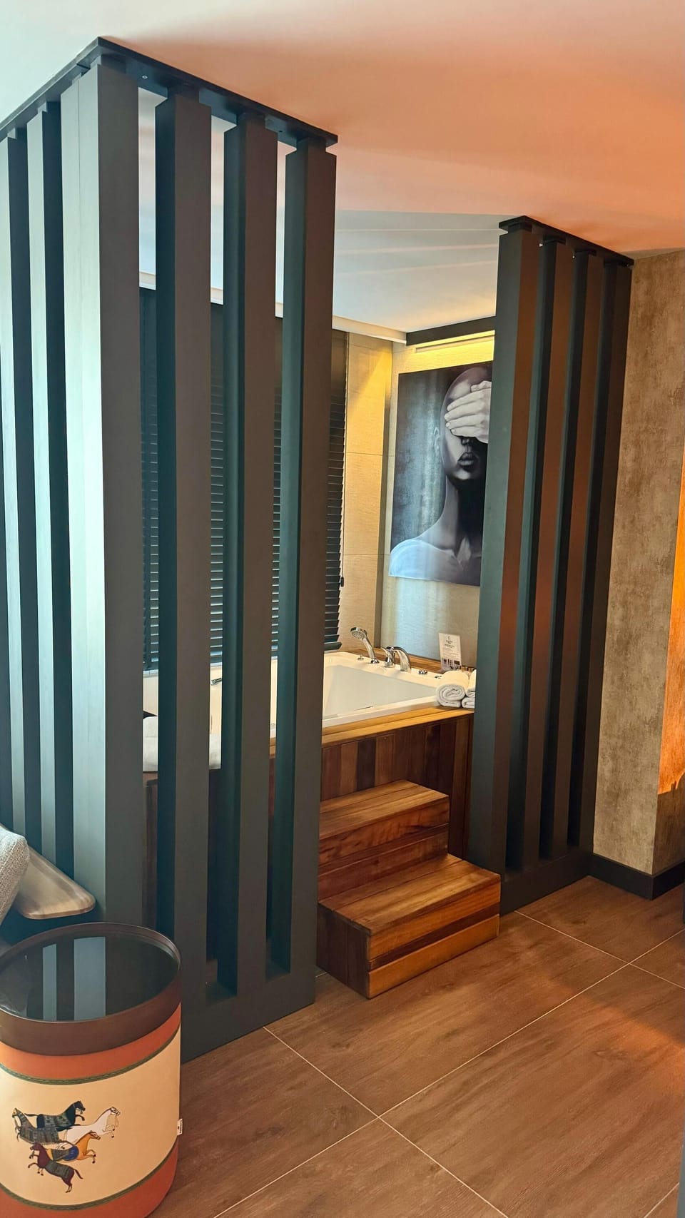 Deluxe Studio Suite | Bathroom | Designer toiletries, hair dryer, slippers, towels