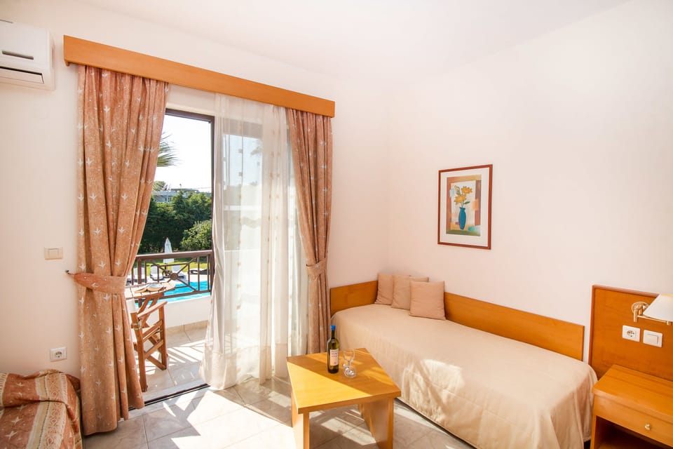 Studio, Balcony, Pool View | In-room safe, blackout drapes, soundproofing, cribs (free)