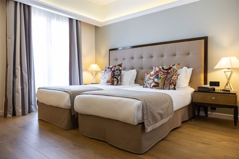 Superior Double Room, Sea View | Premium bedding, minibar, in-room safe, desk