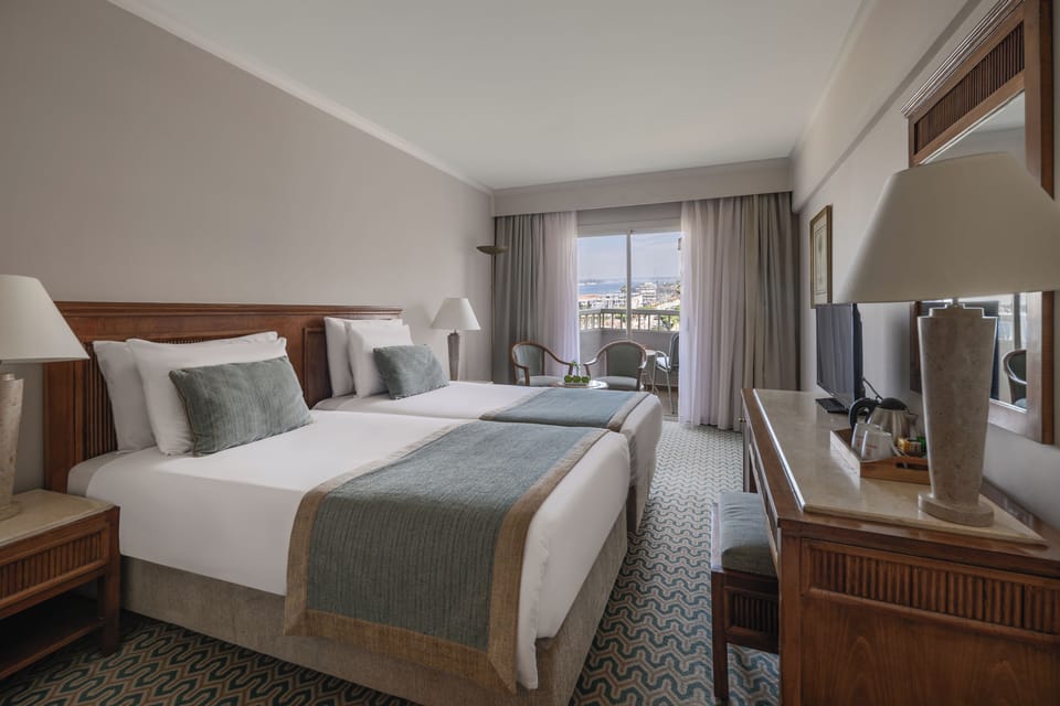 Superior Queen or Twin - Partial Nile View | Minibar, in-room safe, blackout drapes, WiFi