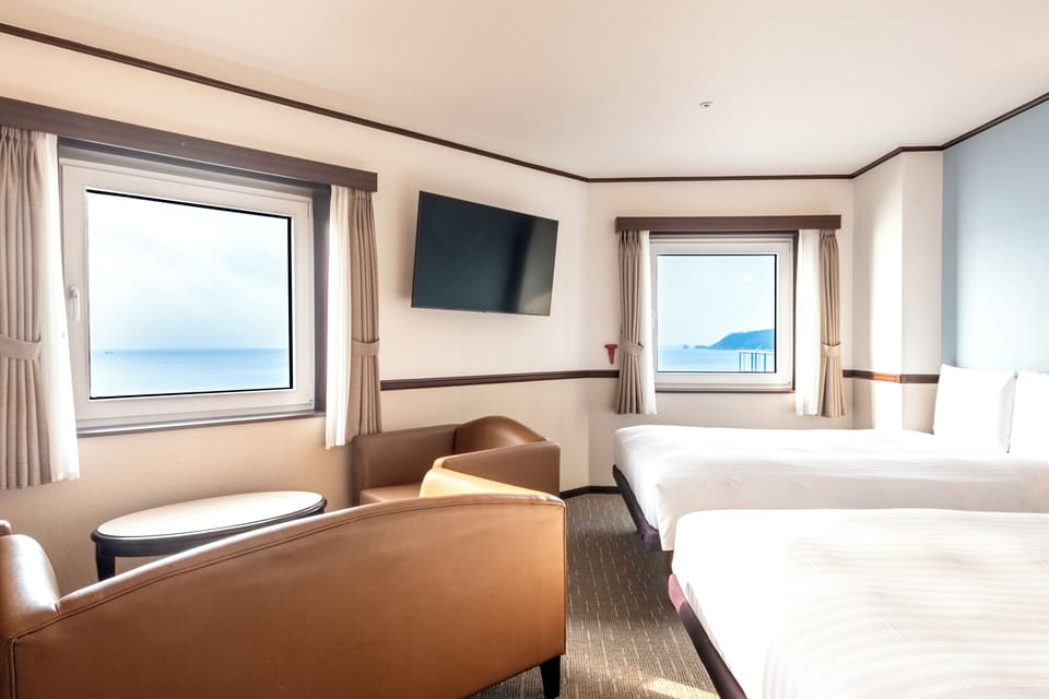 Deluxe Twin Room, Non Smoking (No parking allowed) | Down comforters, in-room safe, blackout drapes, free WiFi