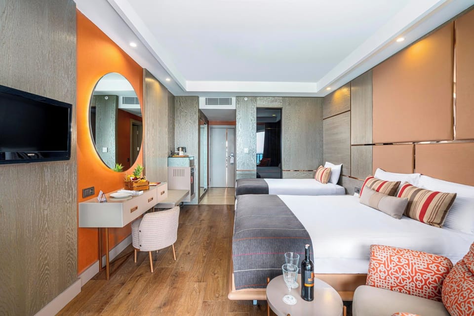 Free minibar items, in-room safe, desk, blackout drapes