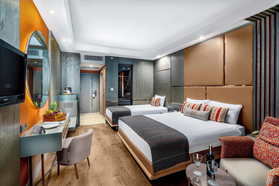 Free minibar items, in-room safe, desk, blackout drapes