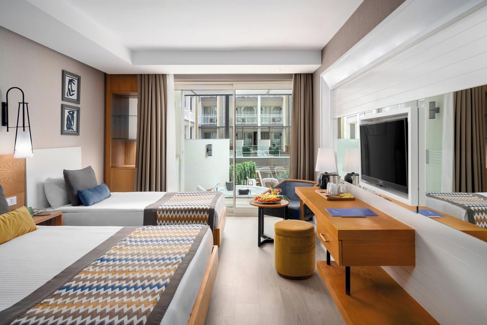 Standard Room, Jetted Tub, Sea View | Minibar, soundproofing, free cribs/infant beds, free WiFi