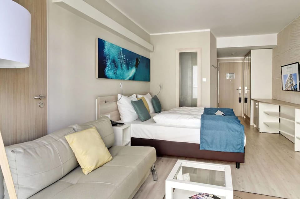 Family Room, Partial Sea View | In-room safe, desk, cribs (free), WiFi (free)