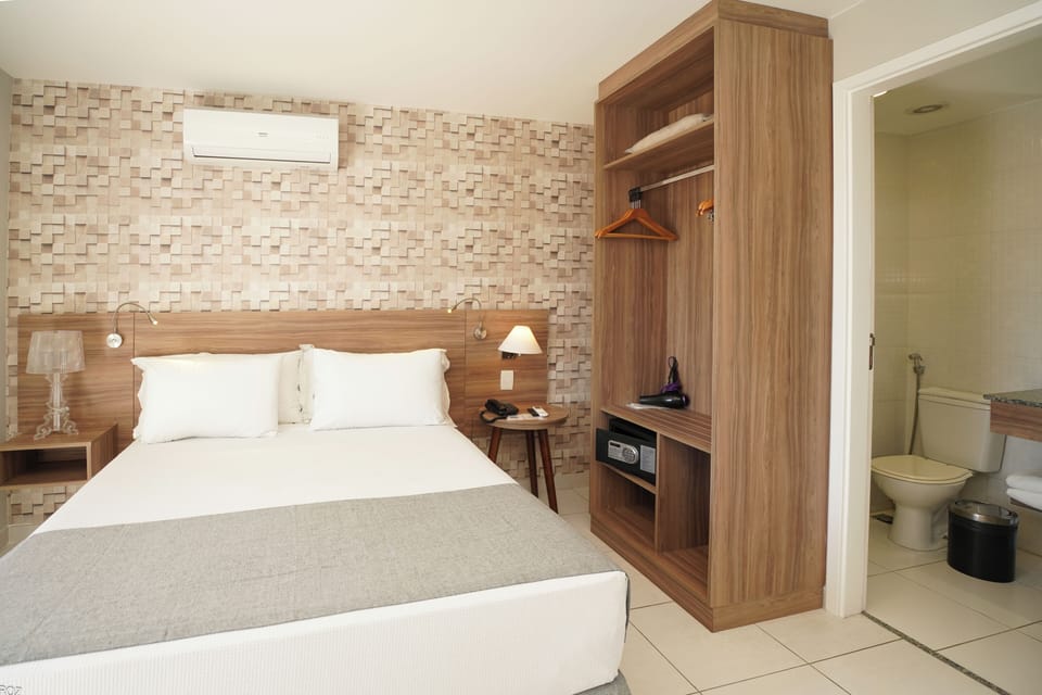 Deluxe Double Room, 1 Double Bed, Patio, City View | Minibar, in-room safe, desk, blackout drapes