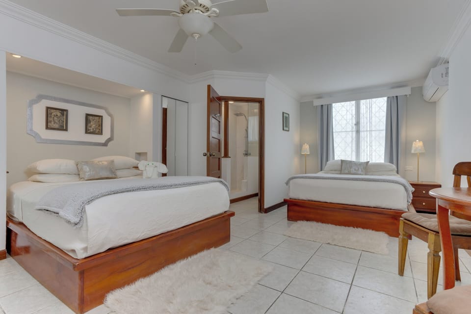 Family Quadruple Room, 2 Queen Beds | 1 bedroom, in-room safe, individually decorated, individually furnished