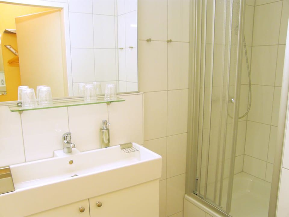 Shower, free toiletries, hair dryer, towels