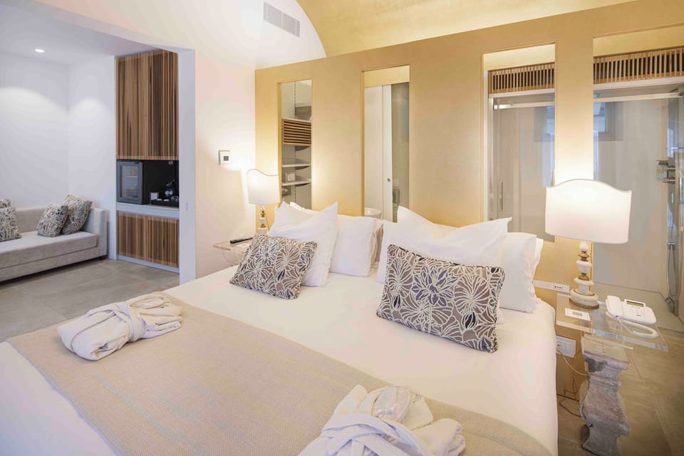Egyptian cotton sheets, premium bedding, down comforters, minibar