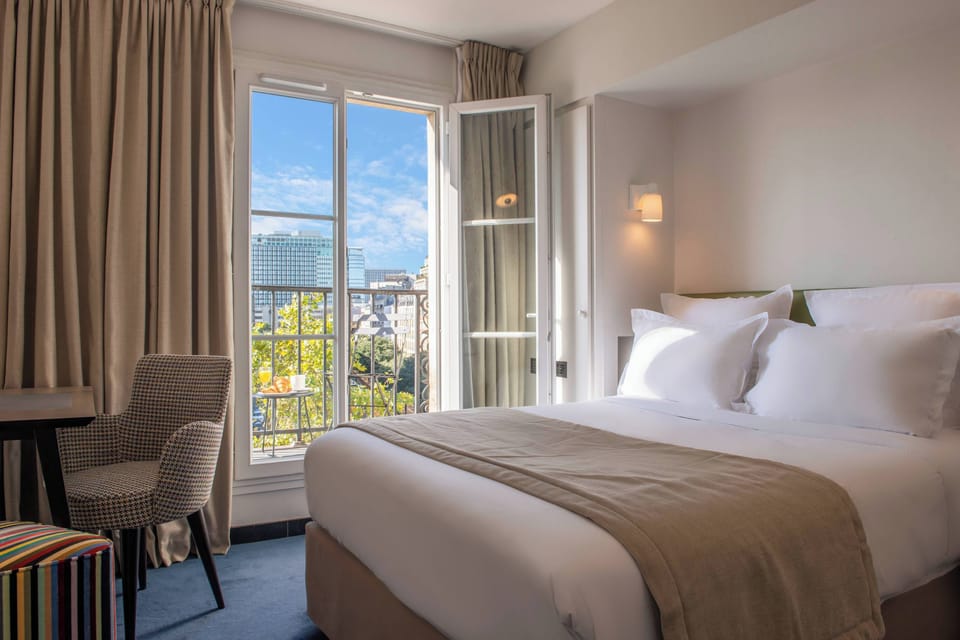 Premium bedding, pillowtop beds, minibar, in-room safe