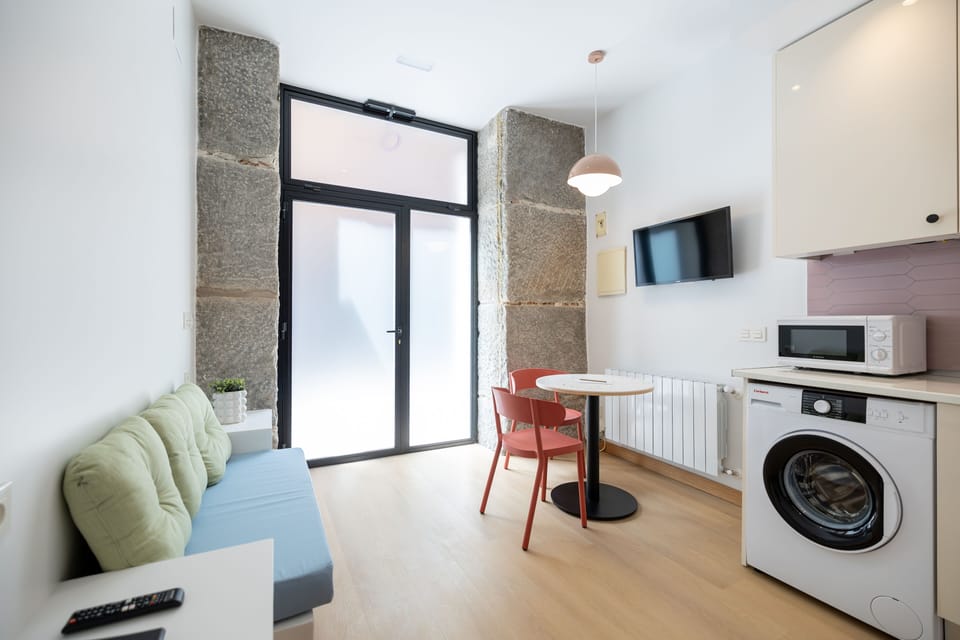 Basic Apartment | Living area | Flat-screen TV