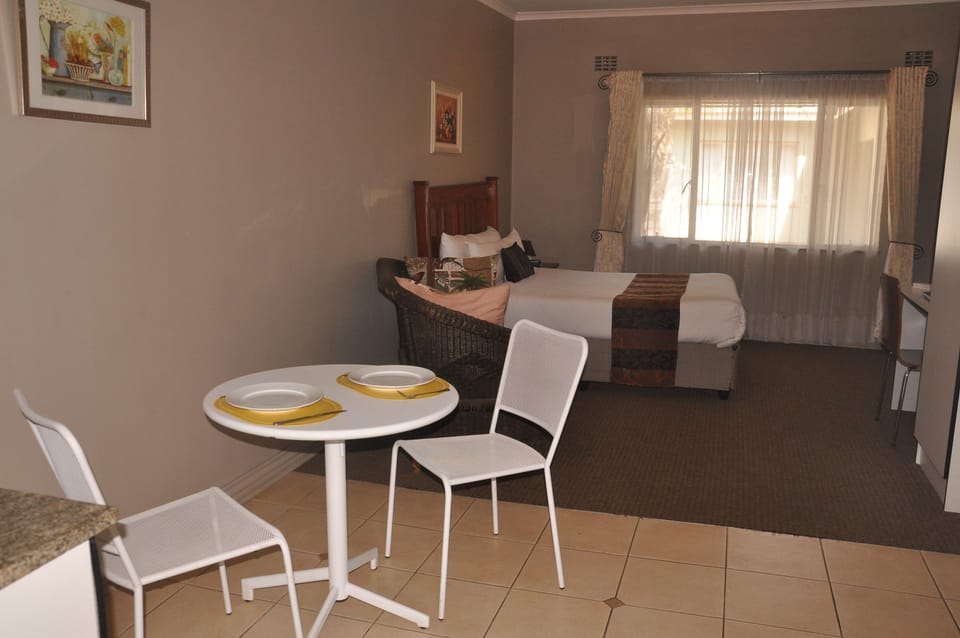Room (Self Catering) | Desk, blackout drapes, free WiFi