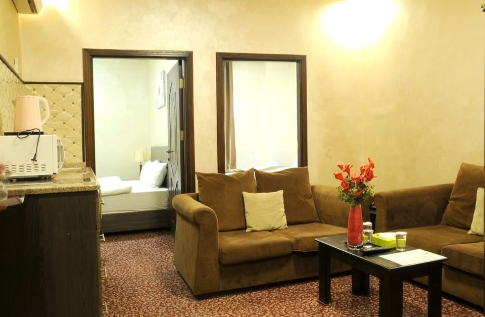 Family Suite | Minibar, in-room safe, desk, iron/ironing board (on request)