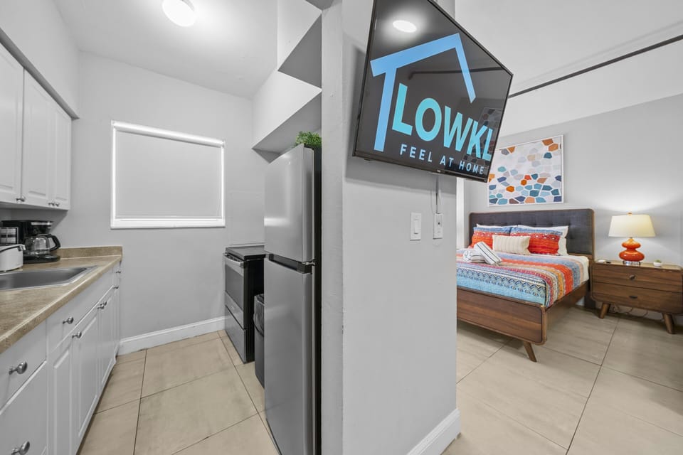 Premium Two Queen Studio w Kitchen & Sofa Bed | Private kitchen | Fridge, microwave, stovetop, coffee/tea maker