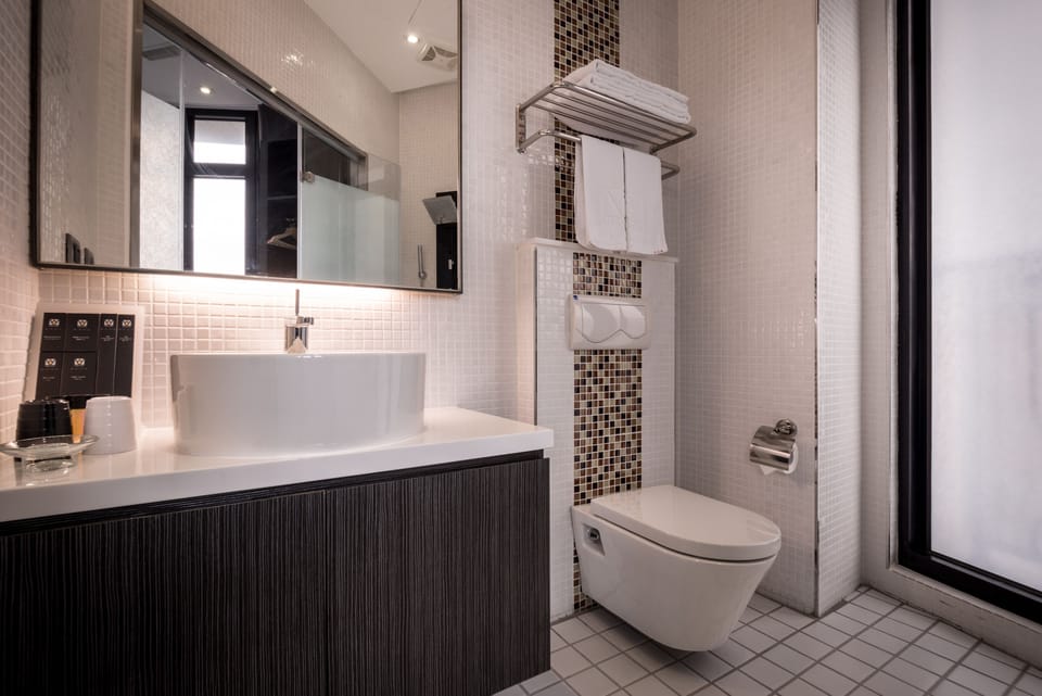Deluxe Double Room, City View | Bathroom | Shower, hair dryer, towels, toilet paper