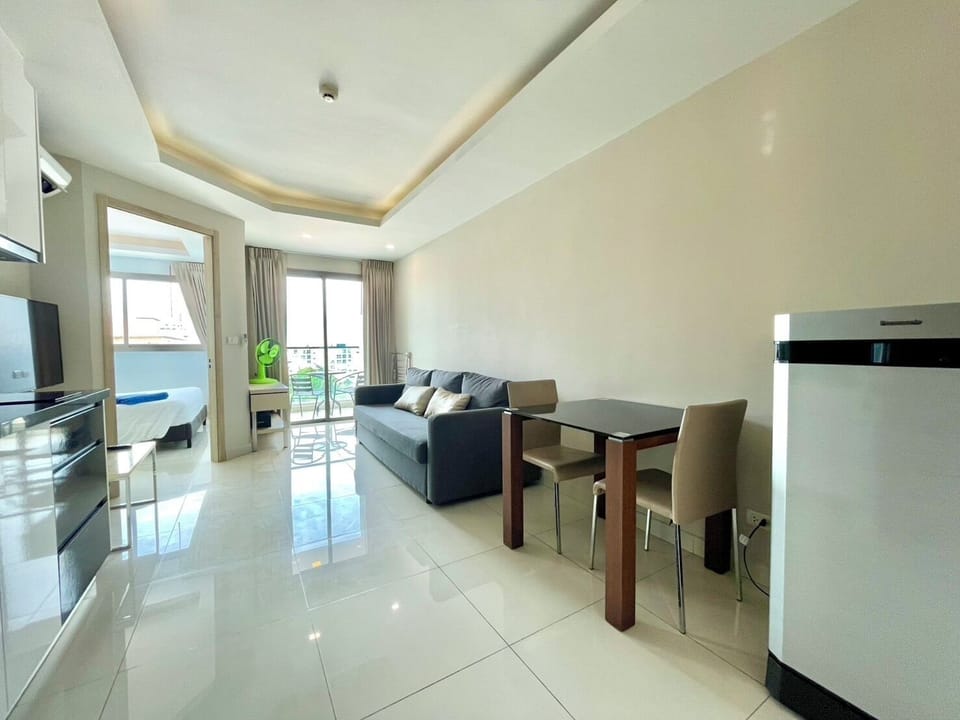 Condo, 1 Bedroom | Living area | Flat-screen TV