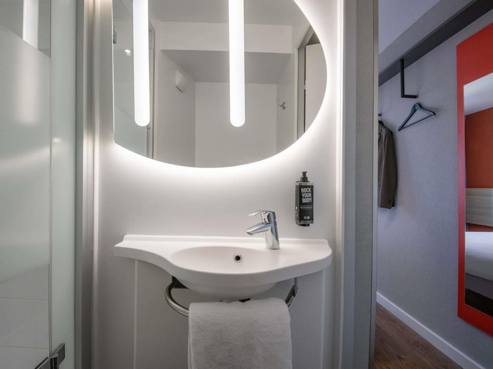 Shower, eco-friendly toiletries, hair dryer, towels