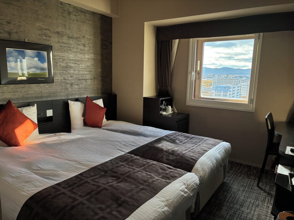 Premium bedding, down comforters, in-room safe, desk