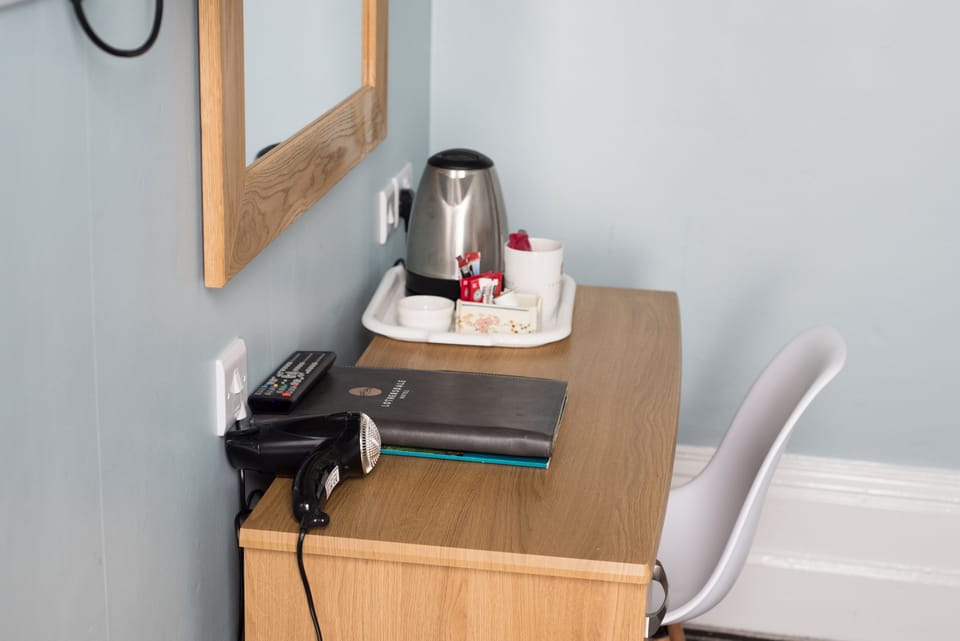 In-room safe, desk, laptop workspace, iron/ironing board