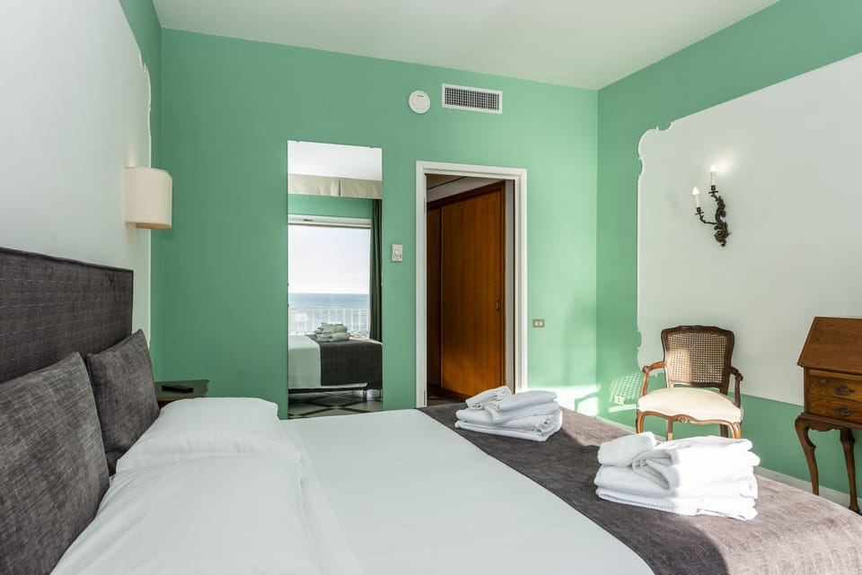 Superior Double Room, Balcony, Sea View | Minibar, blackout drapes, free WiFi, bed sheets