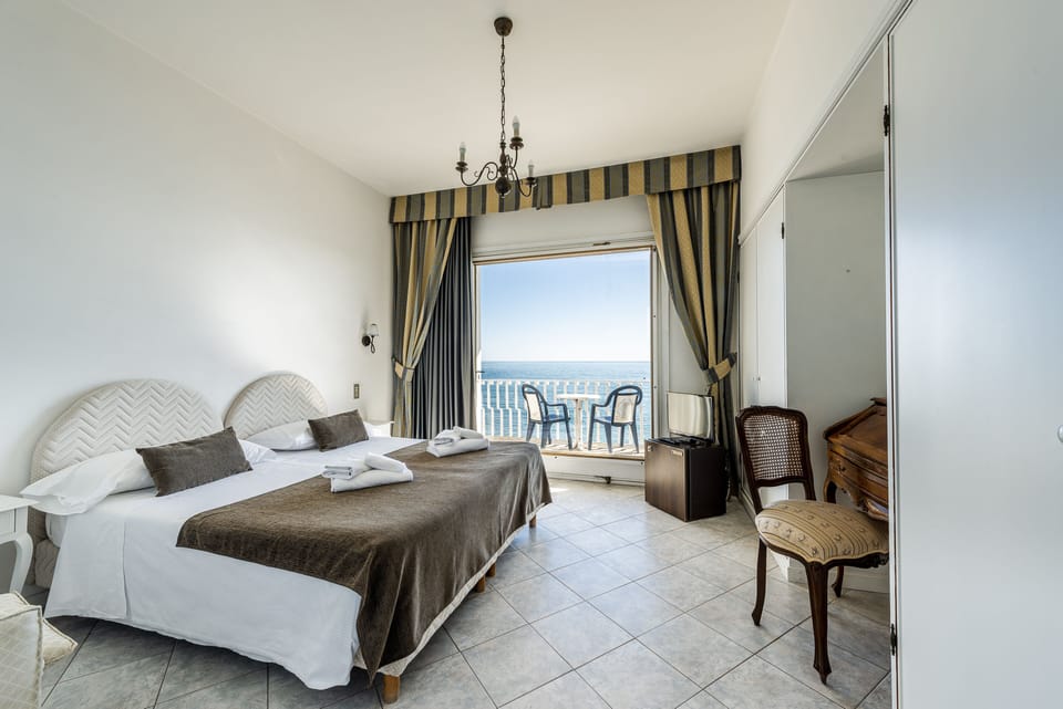 Superior Double Room, Balcony, Sea View | Minibar, blackout drapes, free WiFi, bed sheets