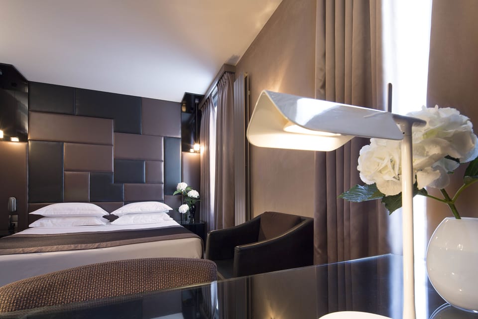 Superior Room | Minibar, in-room safe, individually decorated, desk