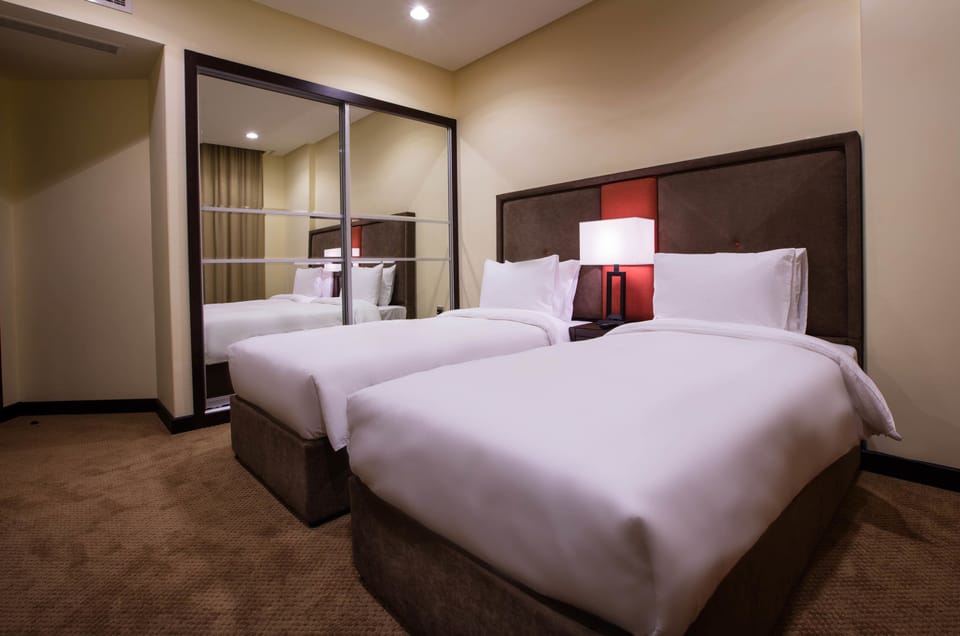 Premium Suite, 2 Bedrooms | Minibar, in-room safe, desk, soundproofing