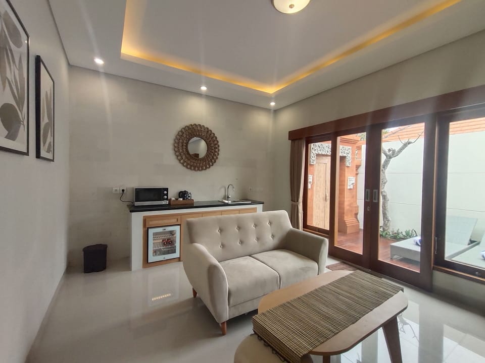 One Bedroom Pool Villa With Hot Tub | Living area | 30-inch LCD TV with cable channels, TV