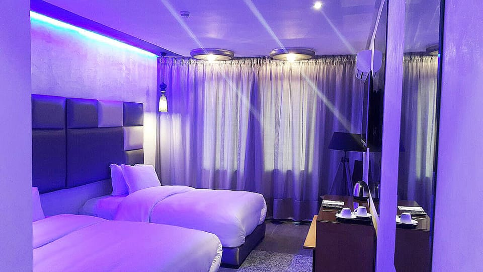 Superior Twin Room | Minibar, in-room safe, desk, free cribs/infant beds