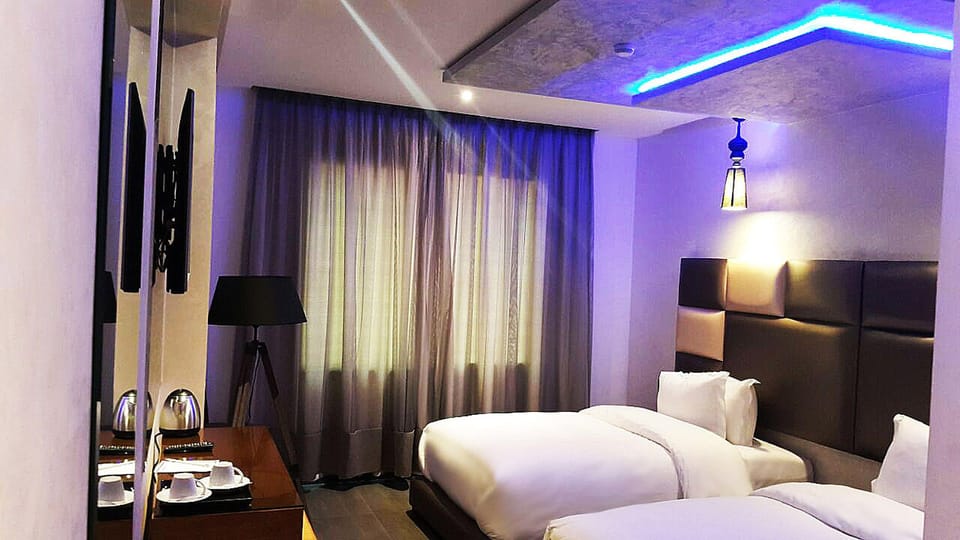Superior Twin Room | Minibar, in-room safe, desk, free cribs/infant beds