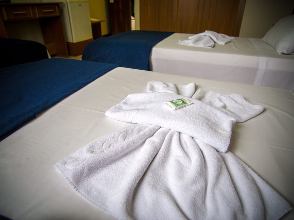 Twin Room | Minibar, desk, free WiFi, bed sheets