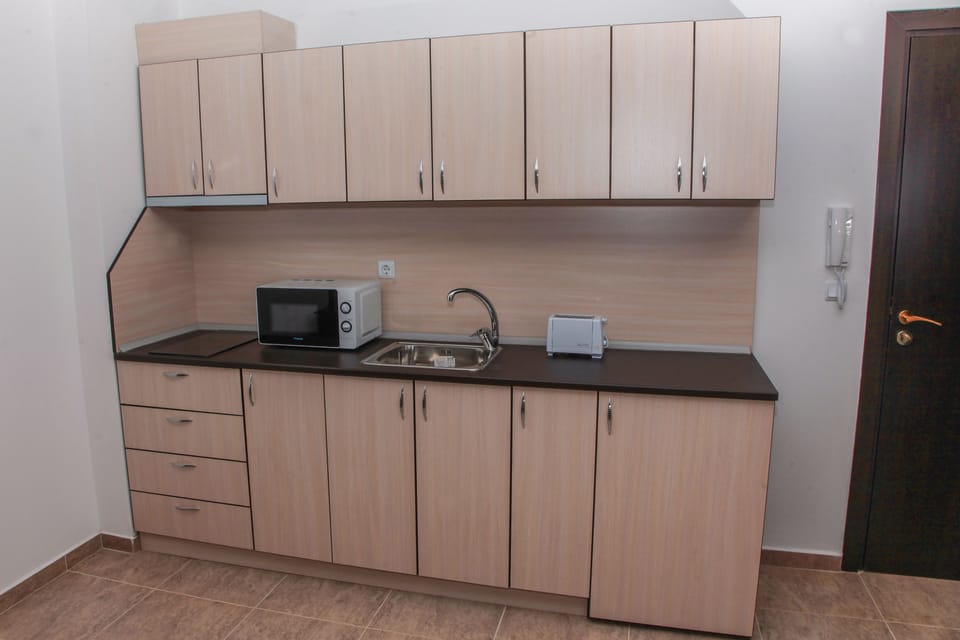 Mini-fridge, microwave, stovetop, electric kettle
